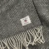 Herringbone ullpledd fra gant i svart